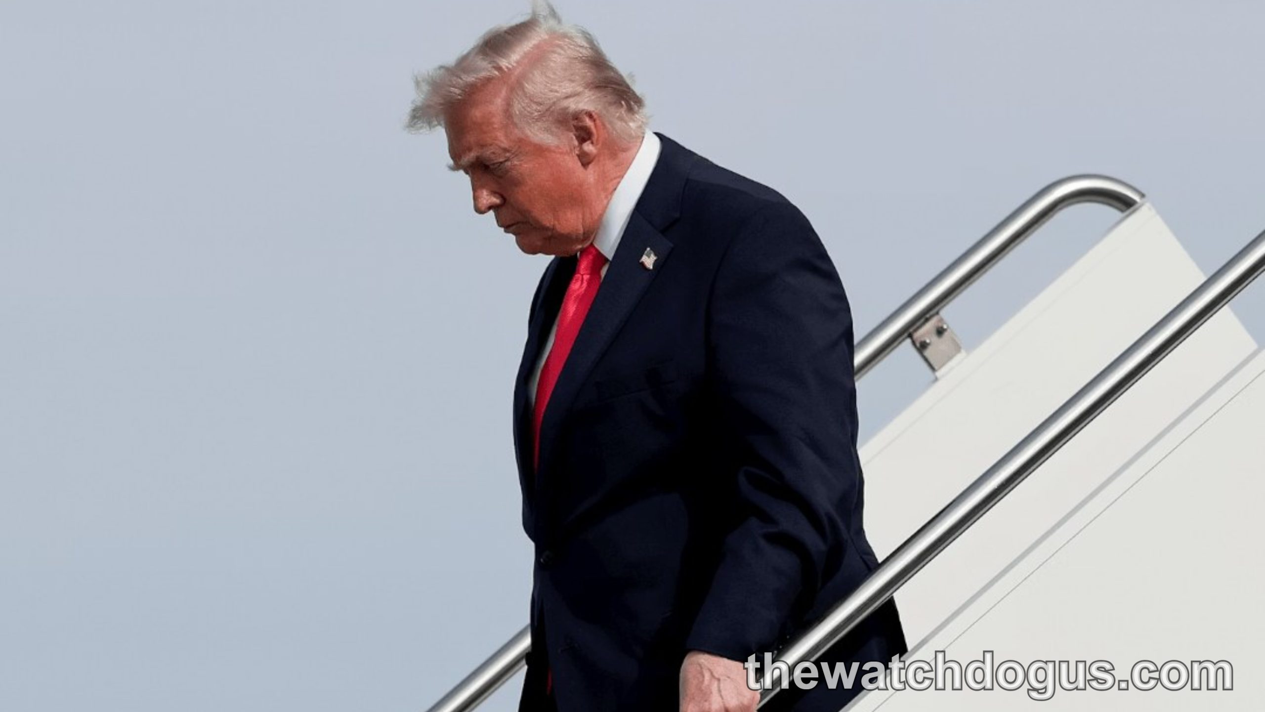 Trump descending aircraft stairs amid White House panic over Iran war escalation and midterm election concerns