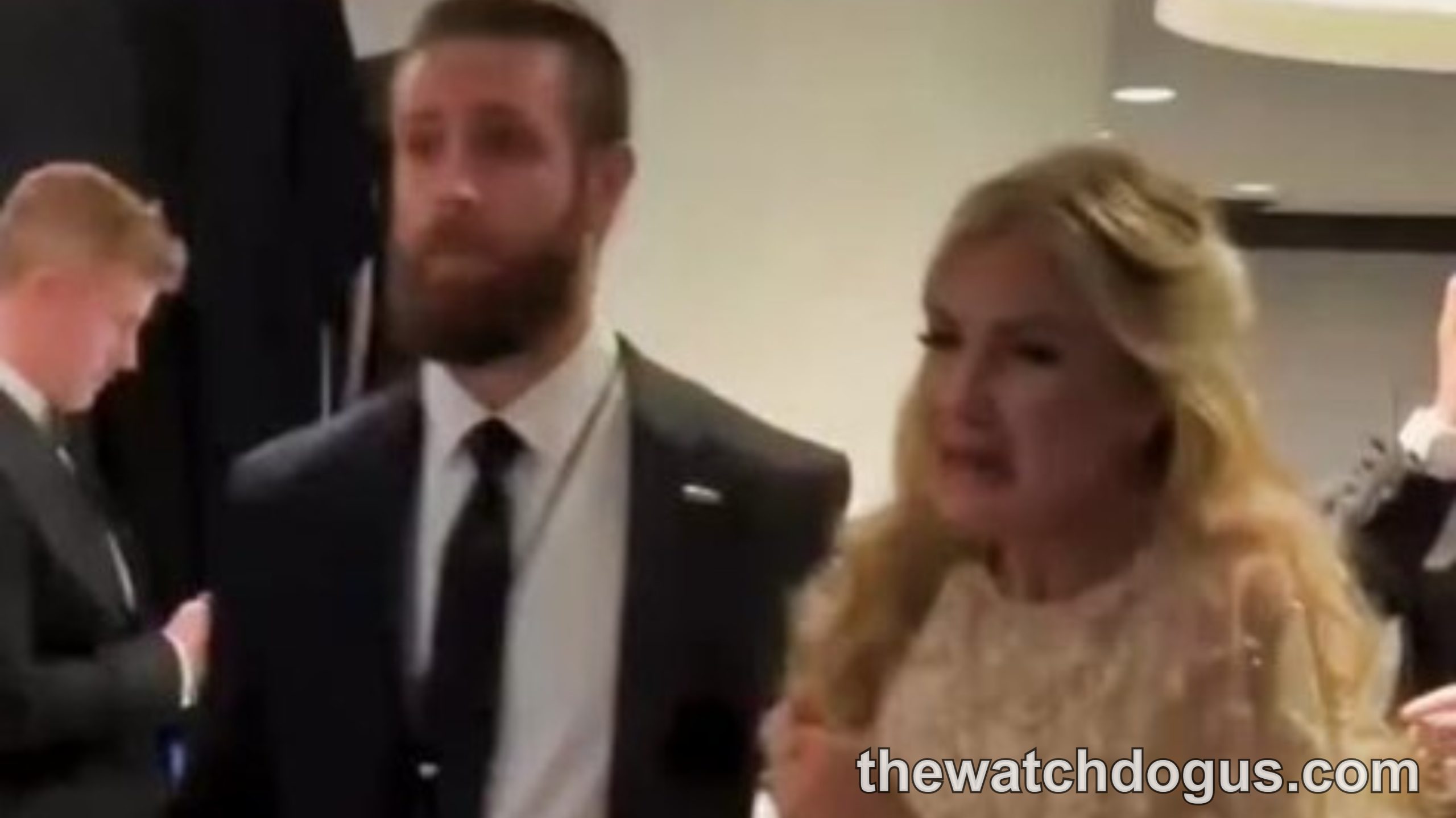 Erika Kirk at White House event in elegant beige dress walking with male companion in formal attire