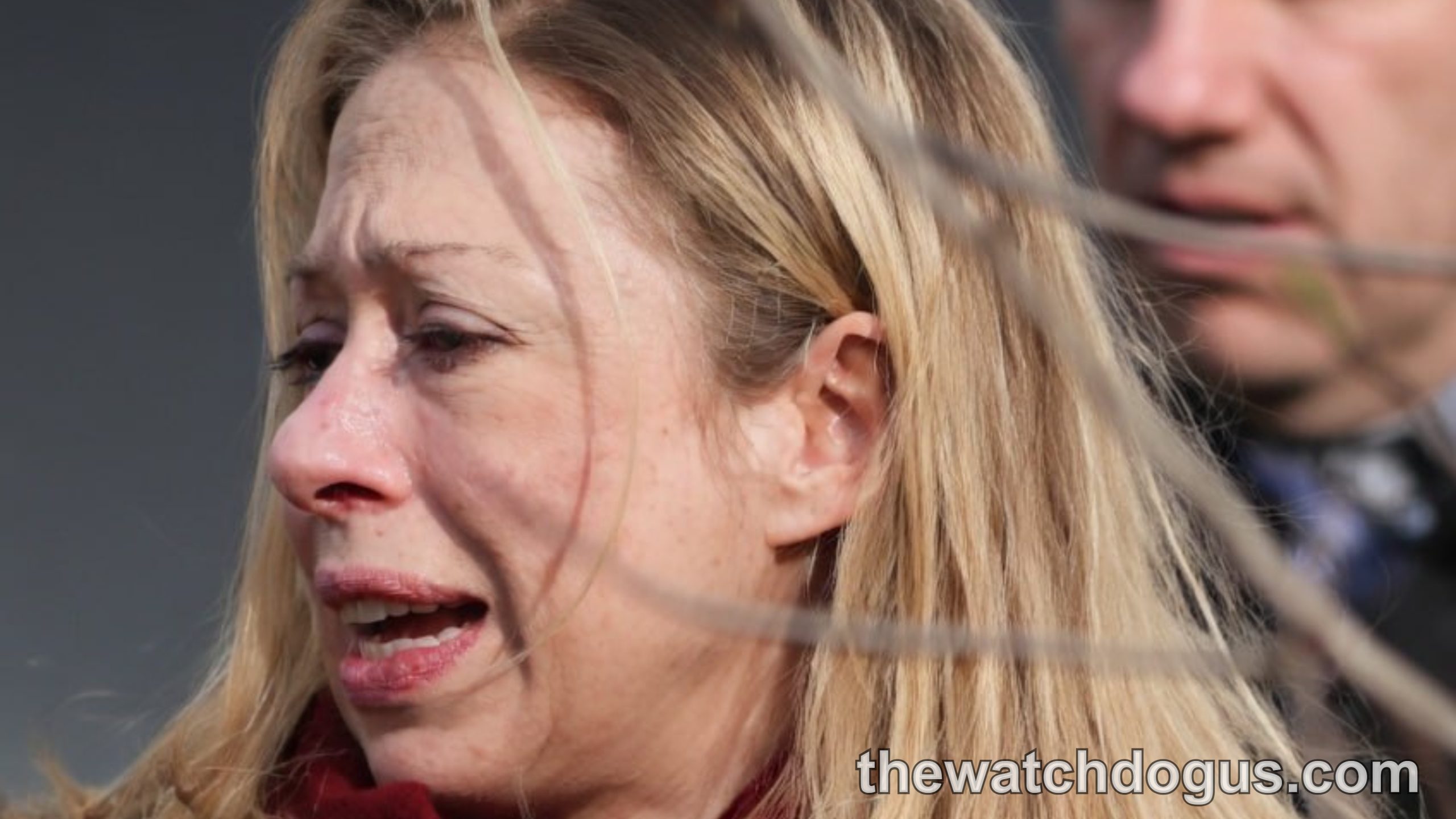 Chelsea Clinton demonstrates leadership speaking at public event wearing black jacket and red scarf