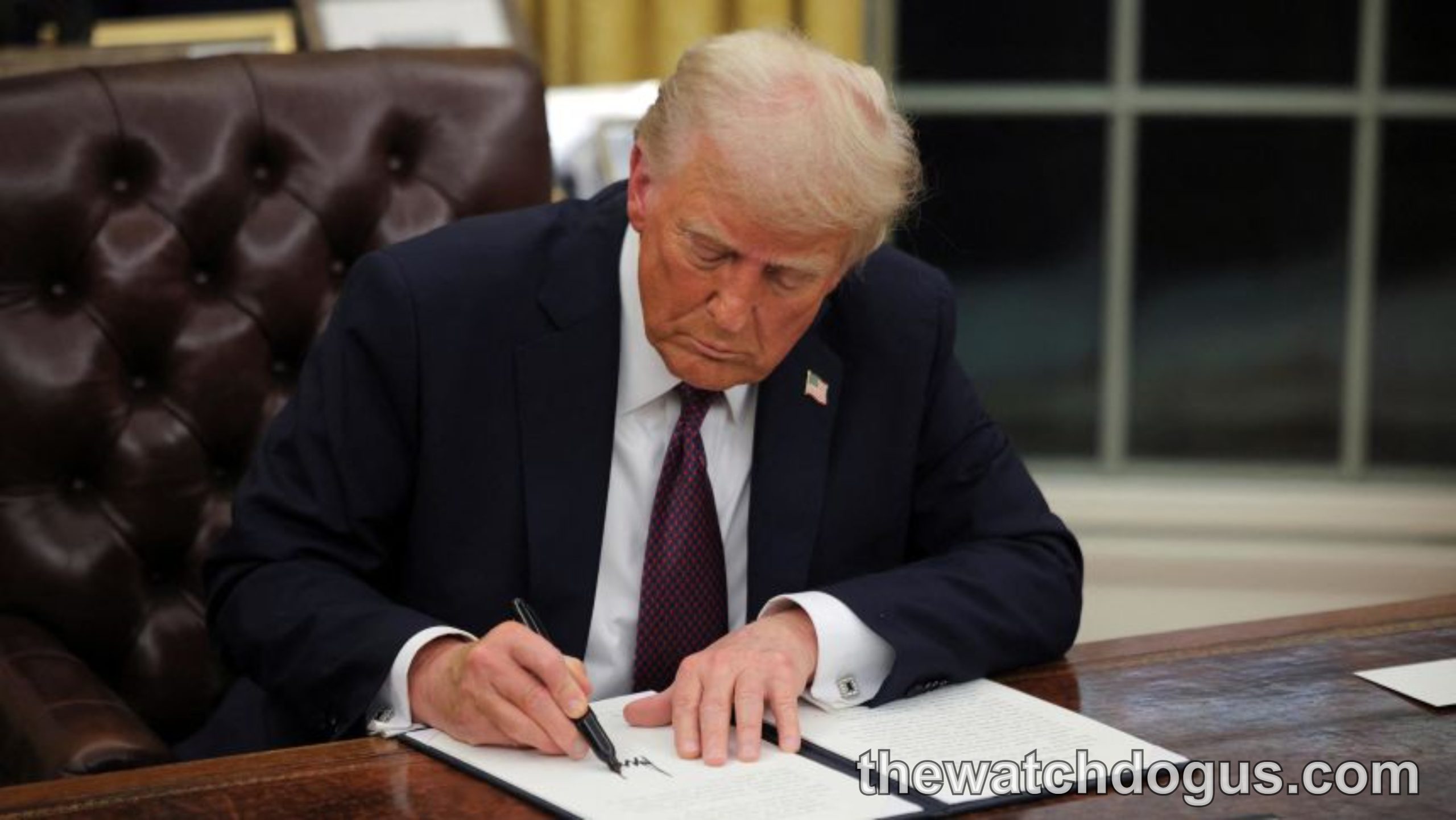 Man in dark suit signing document at desk with Trump psychedelic drugs executive order focus