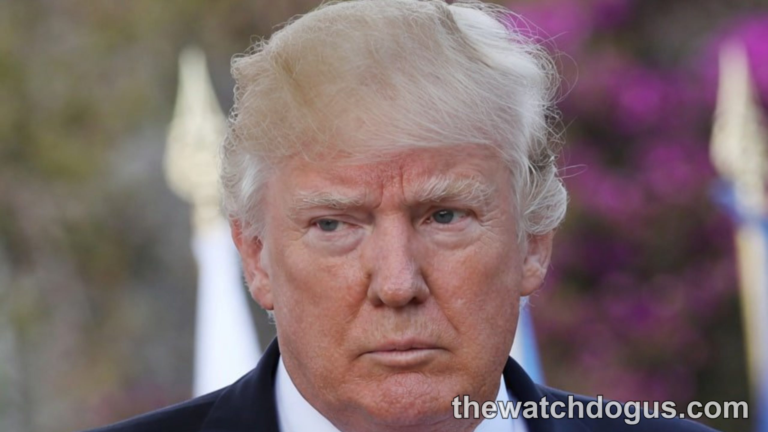 Political figure in formal attire with red tie amid Trump crises attention and controversy