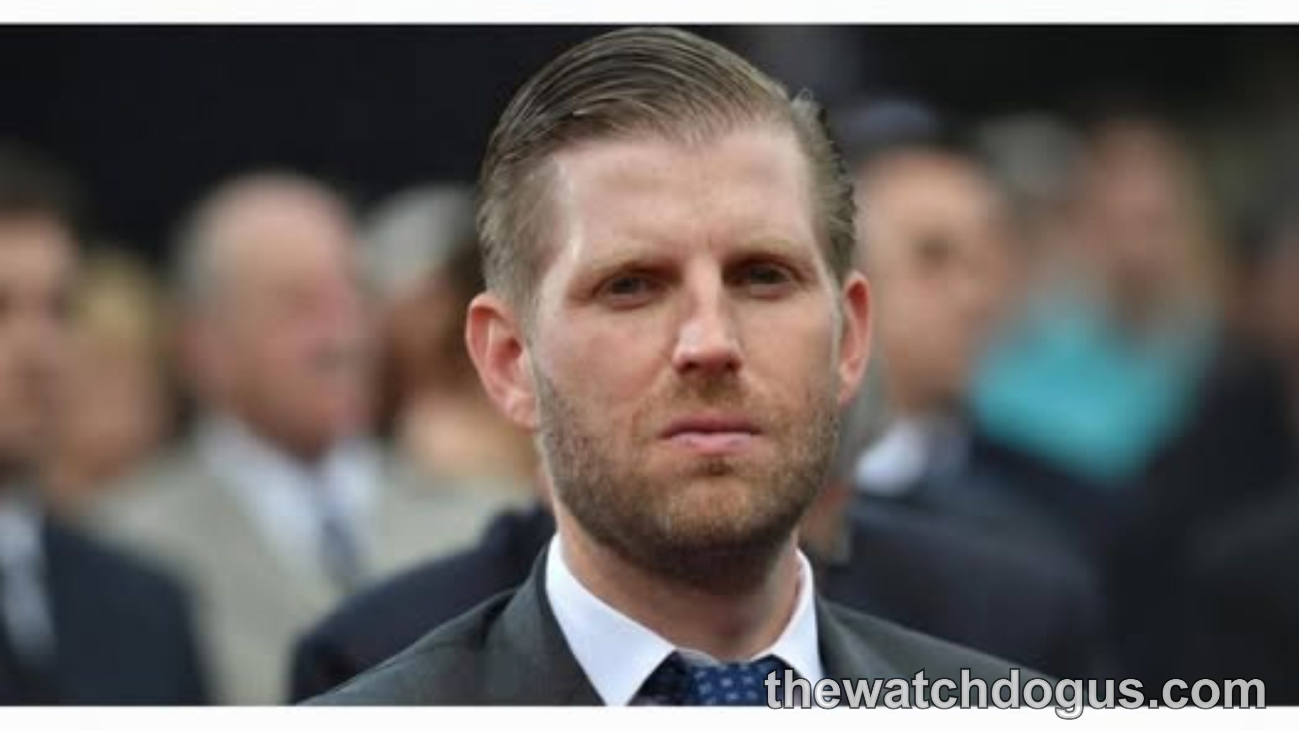 Eric Trump confirmed in New York City wearing dark suit and blue tie at news announcement event