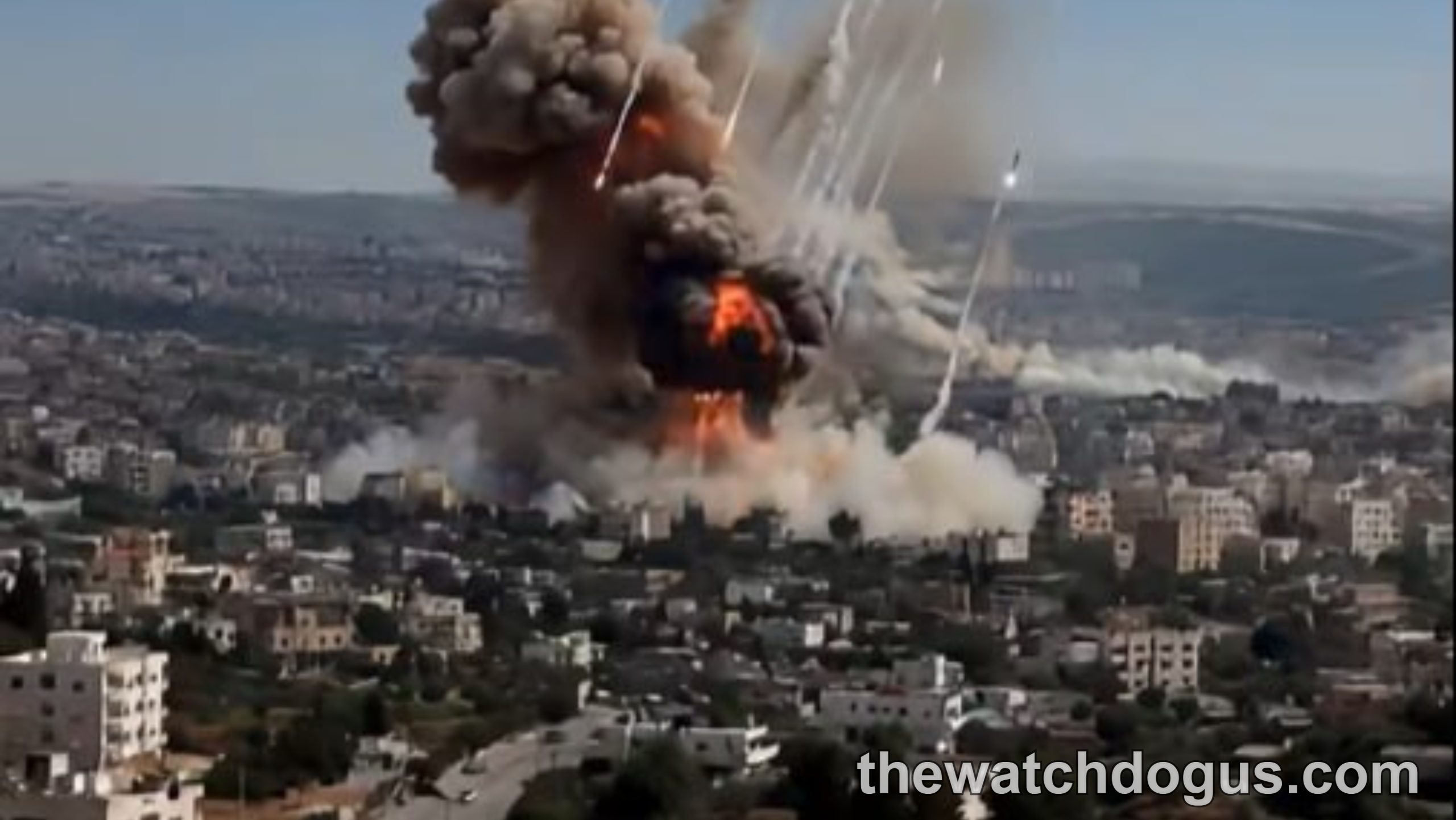 Aerial view of Los Angeles rocket attack with explosion and smoke plumes rising from residential area