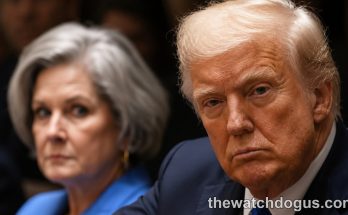 Political figure pointing while seated next to woman in blue jacket during Tulsi Gabbard resignation announcement