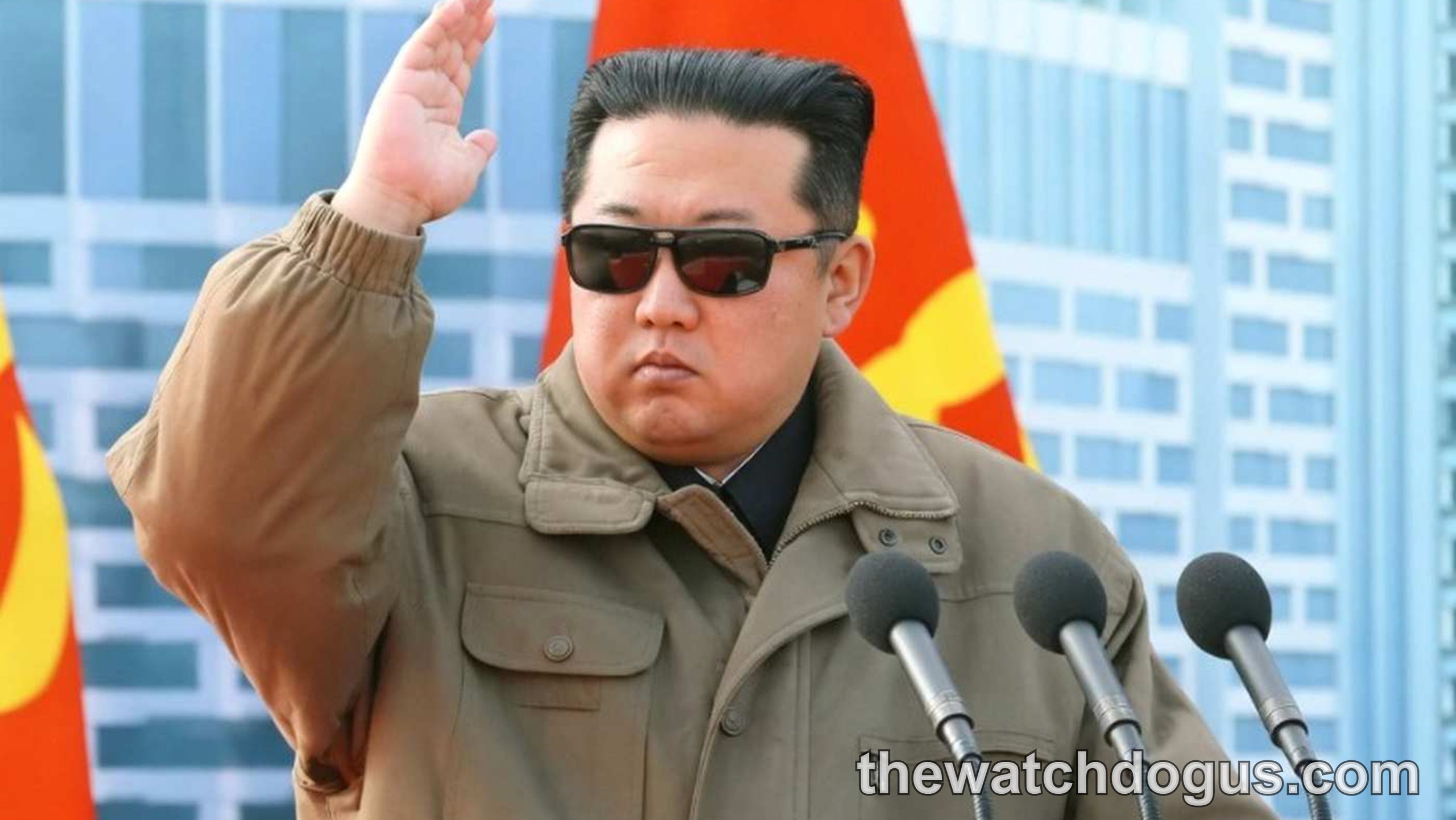Military leader at podium with Korean flag addressing audience about misinformation military Korea tensions