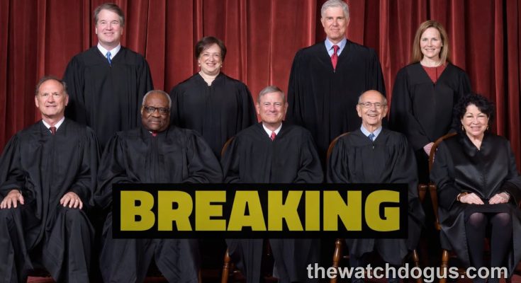Supreme Court justices in official portrait with Breaking News banner regarding Justice Thomas Florida lawsuit
