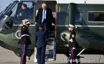 President Trump exits Marine One helicopter with military honor guard present during official state visit