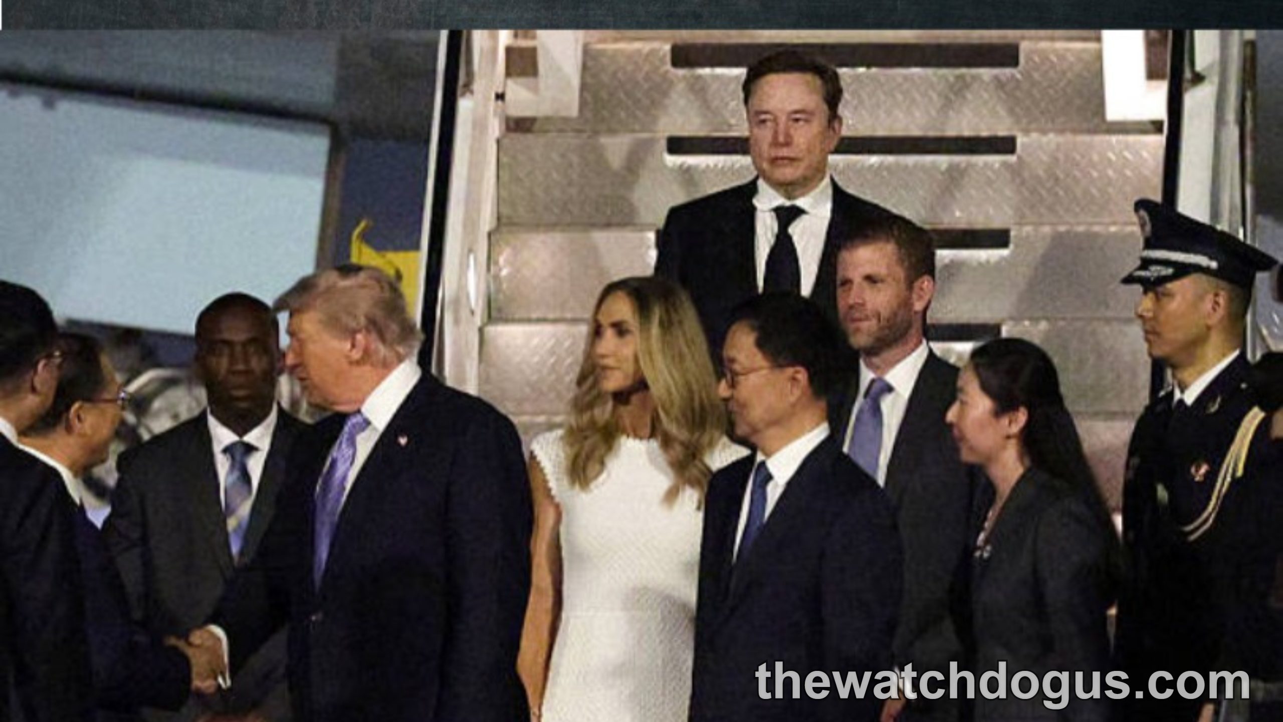 Trump China summit meeting with officials and dignitaries on airport tarmac during diplomatic announcement