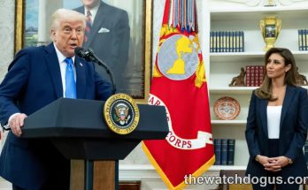 Federal judge resigns Trump administration official at podium in official office setting