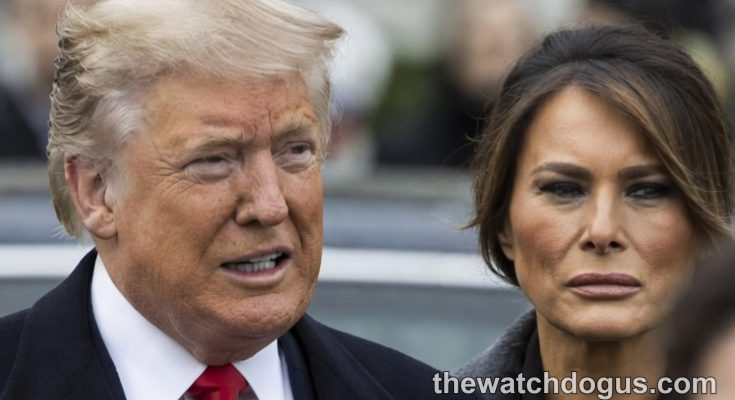 Political couple separation: man in dark suit with red tie and woman in gray coat at public event