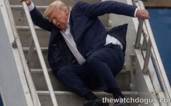 Man in dark suit descending airplane stairs while holding handrail during Trump boarding incident claims