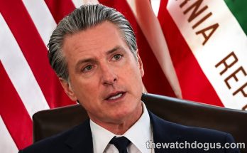 California political figure at podium with American flag backdrop, related to Julia Brownley retirement announcement