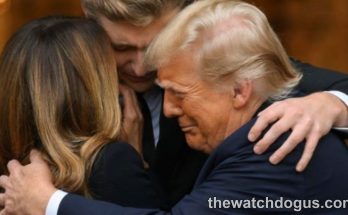 Family members embrace at formal event, reflecting on Barron Trump upbringing and family values
